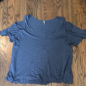 Blue Free People shirt with shoulder cutouts